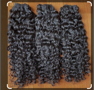 Tissage vierge bouclés Rémi Hair